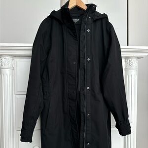 ATHLETA Black Hooded Utility Coat
Sleek. Modern. Effortless.